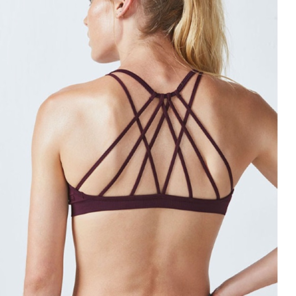 Fabletics Strappy Back Sports Bra in Deep Plum